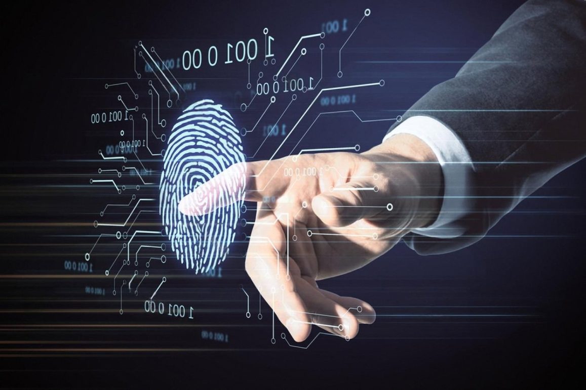 Hand touching a digital fingerprint and binary code, representing biometric KYC and AML identity verification in the UAE