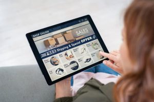 Shopper browsing a rental marketplace on a tablet, tapping a category tile